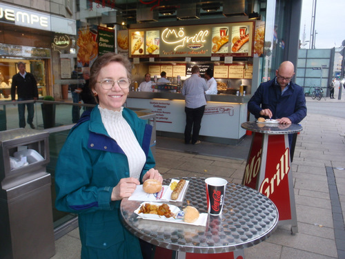 Dennis and Terry do Dinner on the fly; Bratwurst for T and Curry Brat for D.